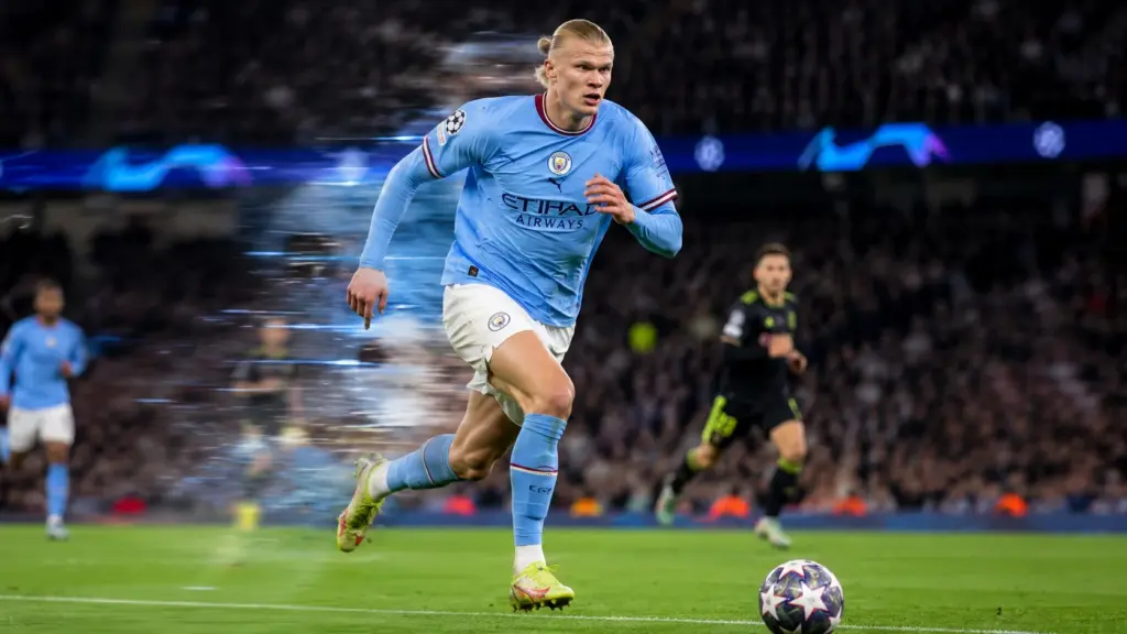 Erling Haaland sprinting during a UEFA Champions League match