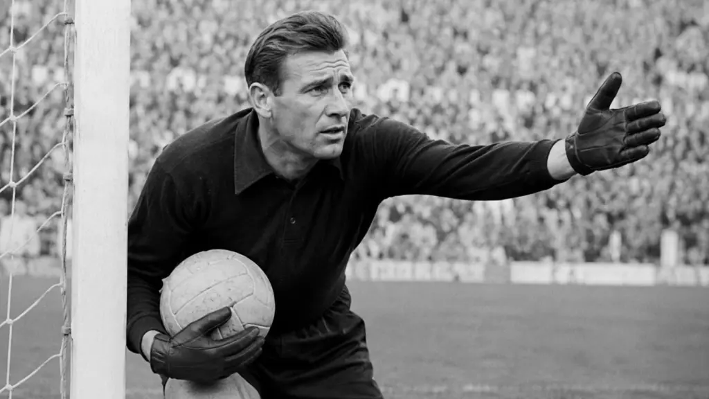 Lev Yashin wearing his famous black goalkeeper kit during a match
